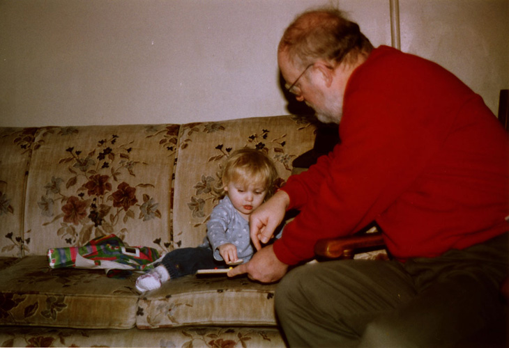 Natalie and Grandpa Brian working on Puzzle